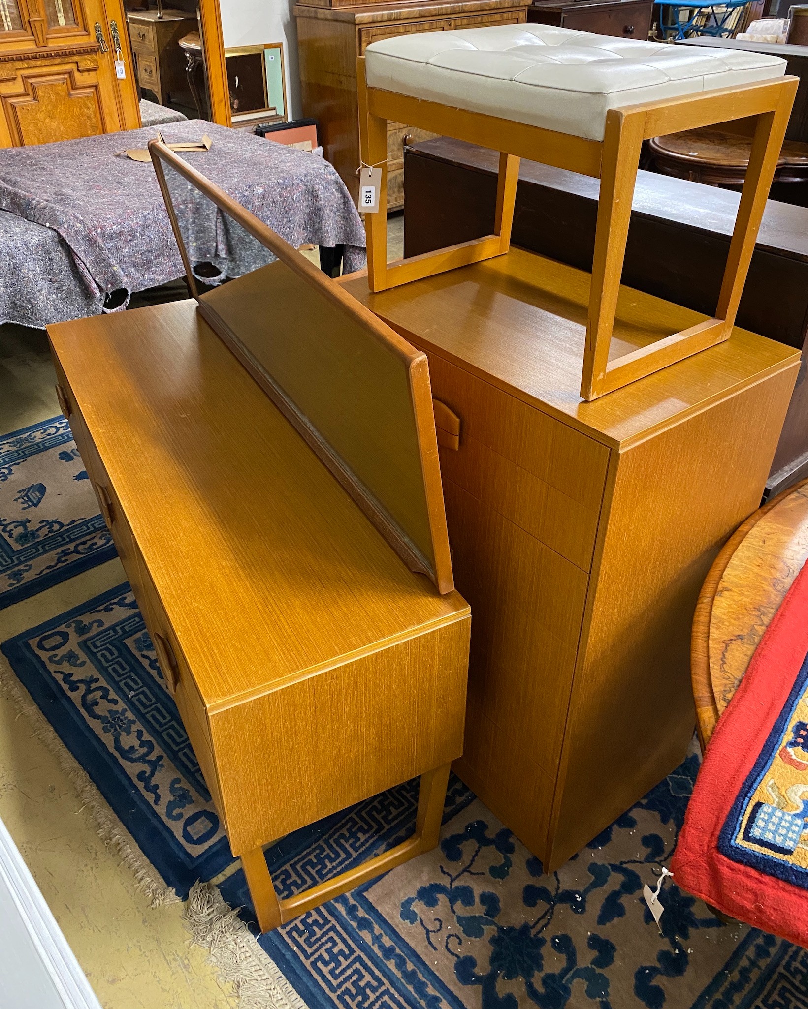 A mid century teak dressing table, width 147cm, depth 43cm, height 112cm, together with a stool, chest and folding card table